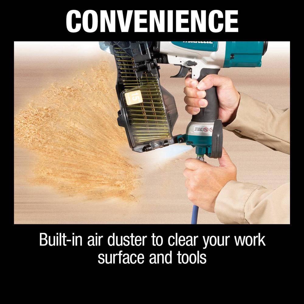 A woodworker utilizing the built-in air duster button on the Makita AN613 pneumatic siding coil nailer to quickly clear sawdust and debris from a work surface.