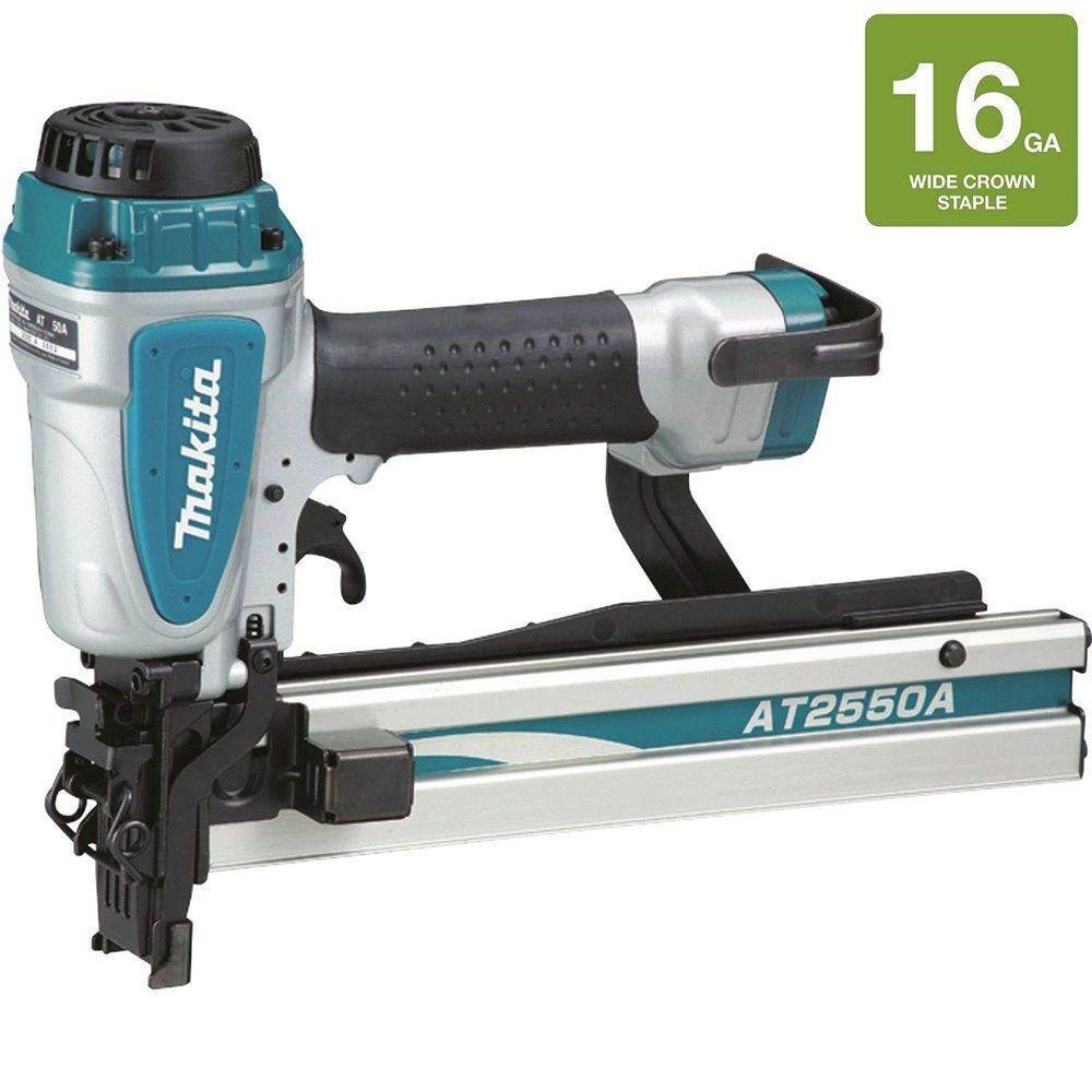 Makita AT2550A Pneumatic 16 Gauge 1 Inch Wide Crown Stapler with labeled gauge information, showing durable top‑loading magazine and ergonomic grip for heavy‑duty construction use.