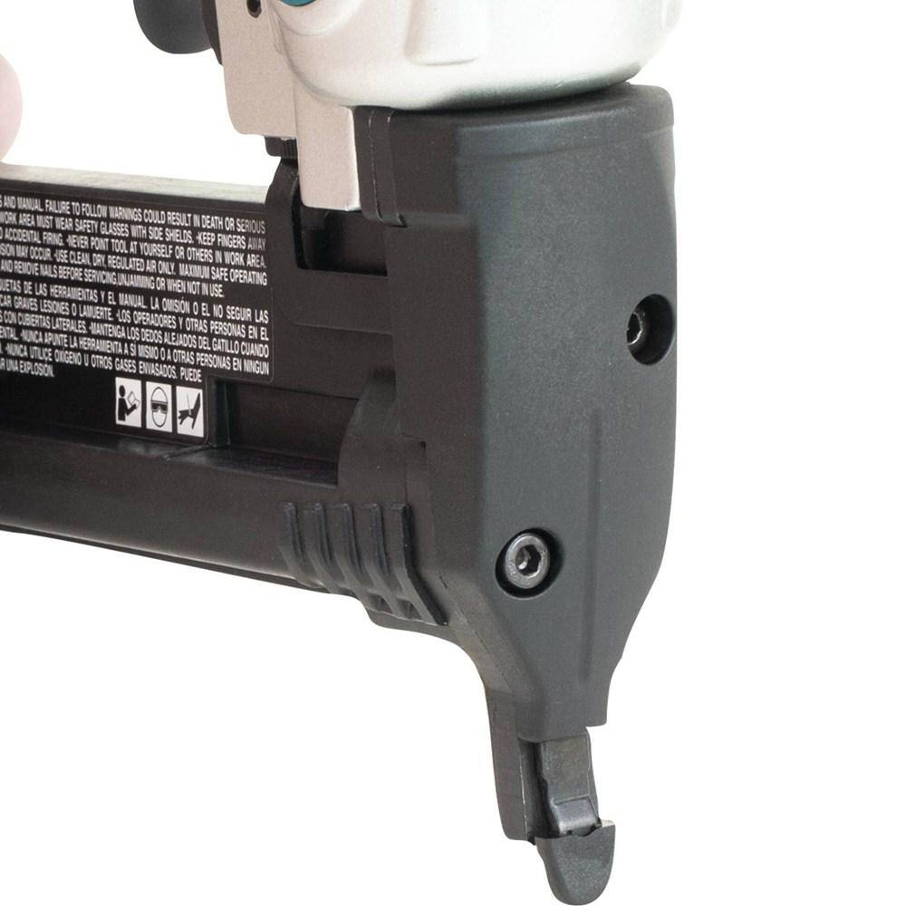 Extreme close-up of the narrow nose design and non-marring tip of the Makita AT638A pneumatic crown stapler, engineered for precise staple placement in tight areas.