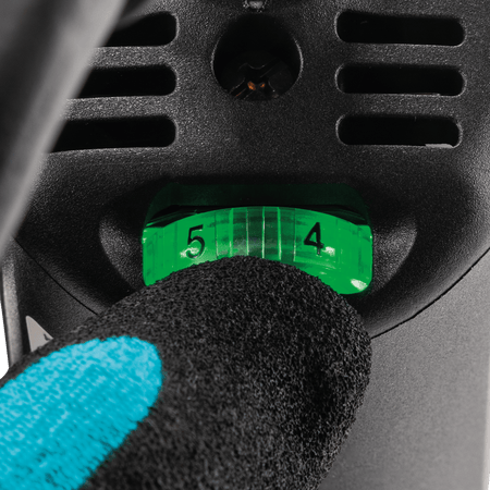 Close-up of the variable speed control dial on the Makita grinder adjusted to setting 5 for maximum RPM output.