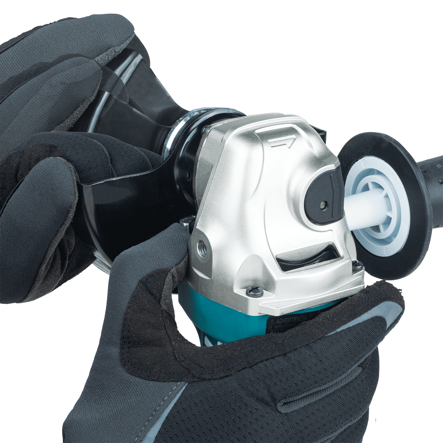 Gloved operator adjusting the rotation angle of the permanently attached non-removable wheel guard on the Makita GA4553R.