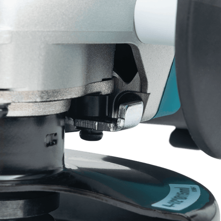 Close-up of the tool-less guard adjustment mechanism permanently mounted to the gear housing of the Makita GA4553R grinder.