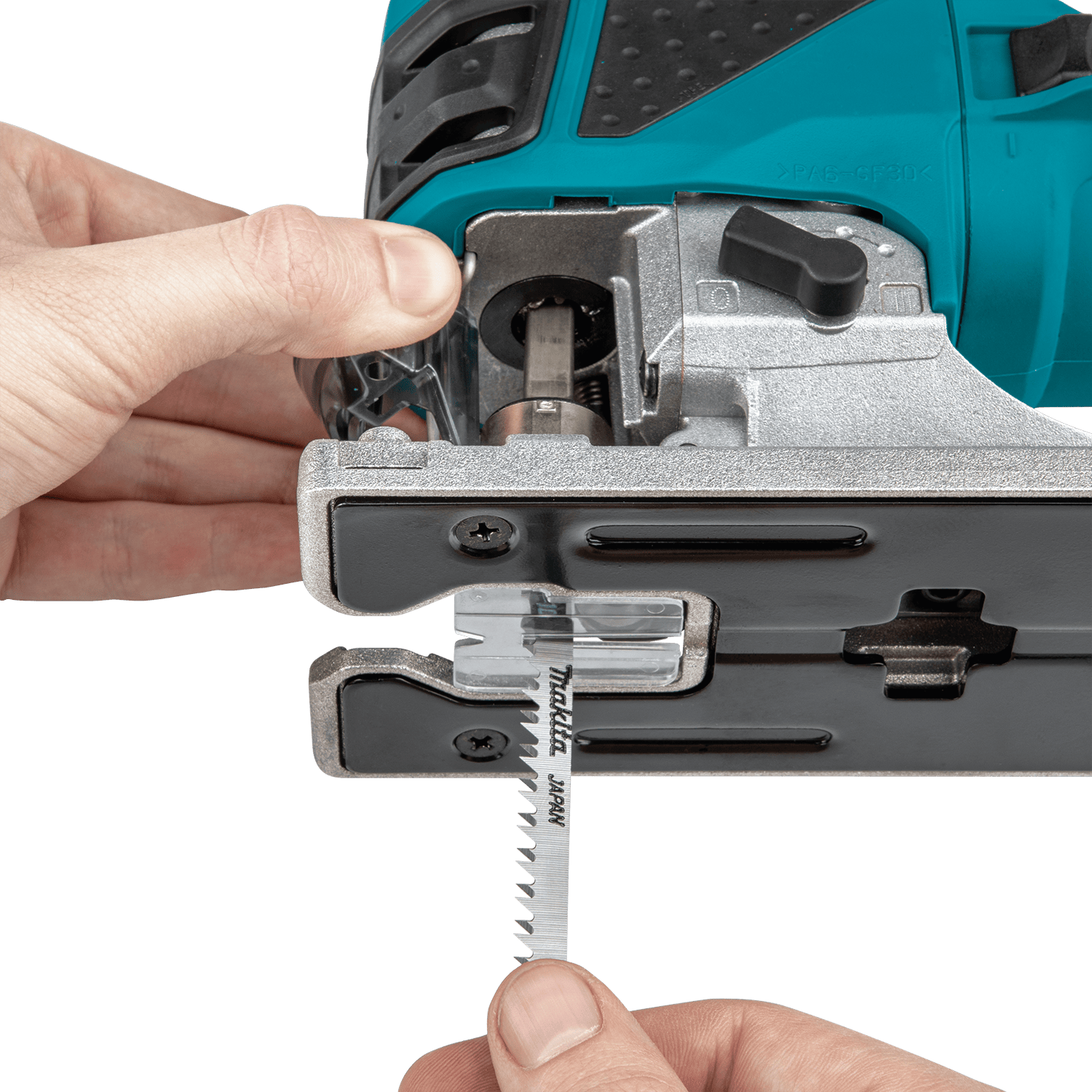 Demonstration of the spring-loaded tool-less blade ejection lever on the Makita 4351FCT jig saw for rapid T-shank blade changes.