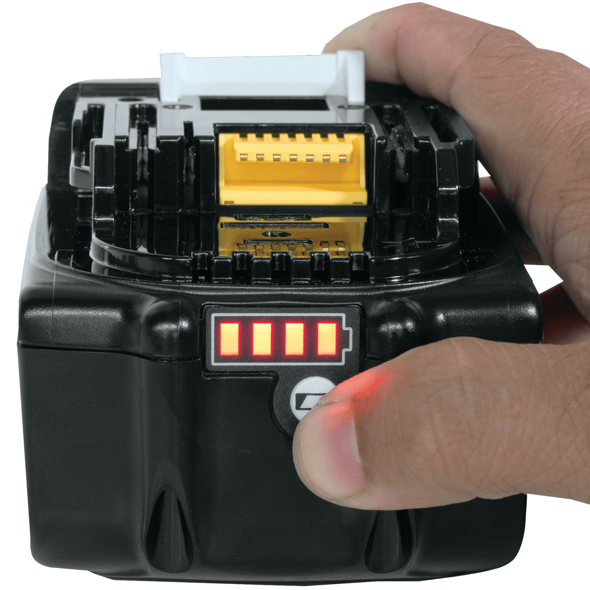 Finger pressing the battery check button on a Makita BL1850B 18V LXT 5.0Ah battery to display four illuminated LED charge bars.