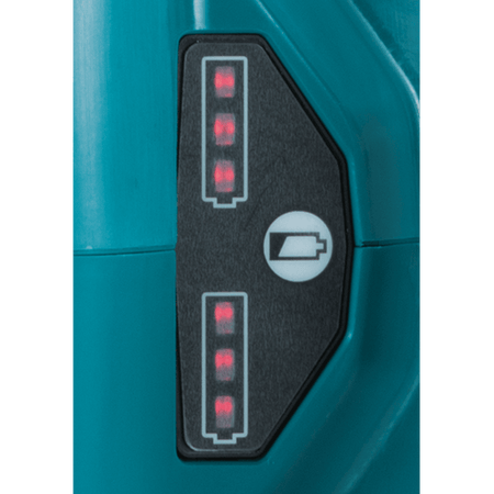 LED battery fuel gauge panel on the Makita XCU04 chainsaw indicating full 3-bar charge levels for both installed 18V LXT batteries.
