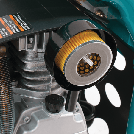 Automotive-style industrial air intake filter cartridge installed on the Makita MAC2400 cast iron pump head.