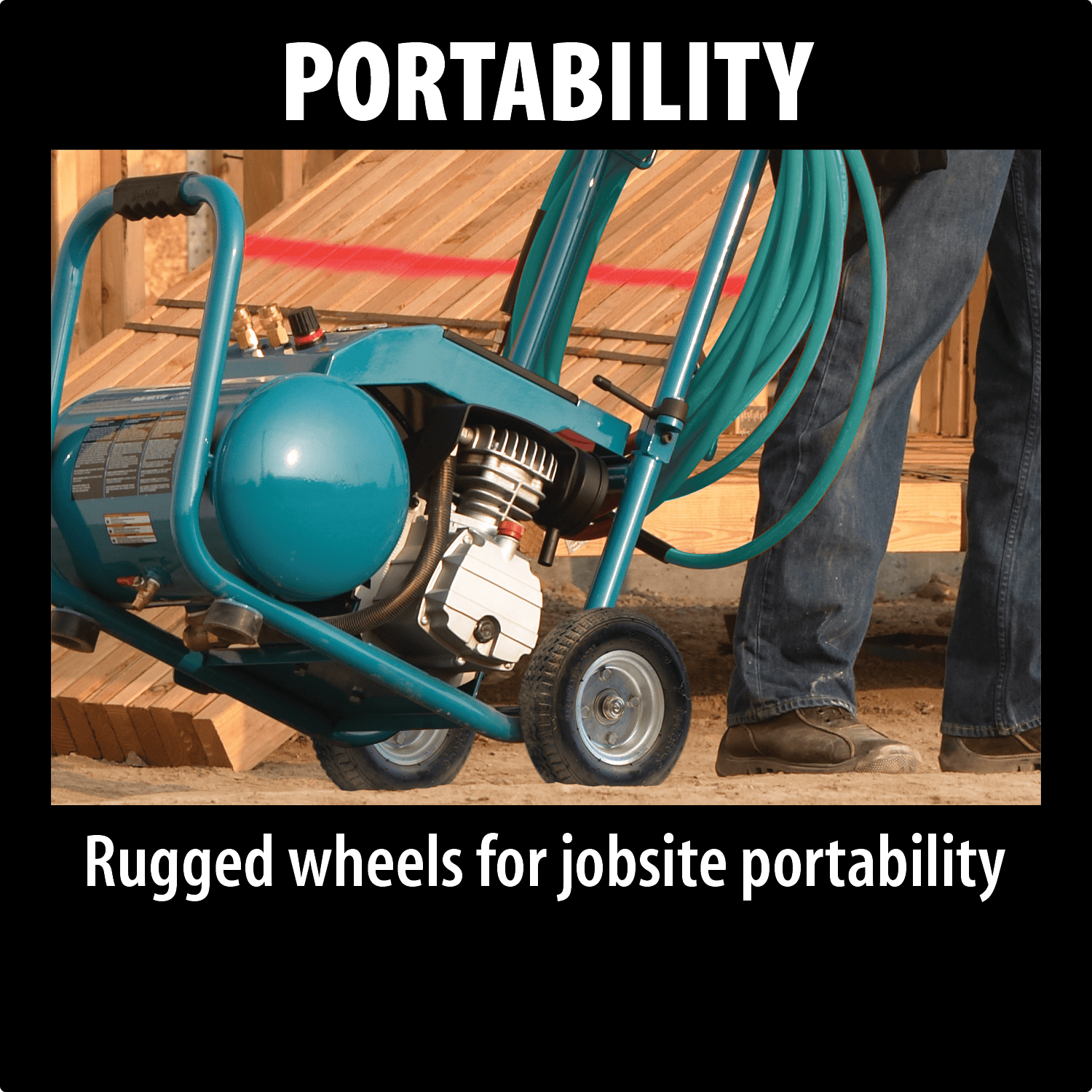 Worker transporting the wheeled Makita MAC5200 air compressor with an attached hose wrap on a jobsite.