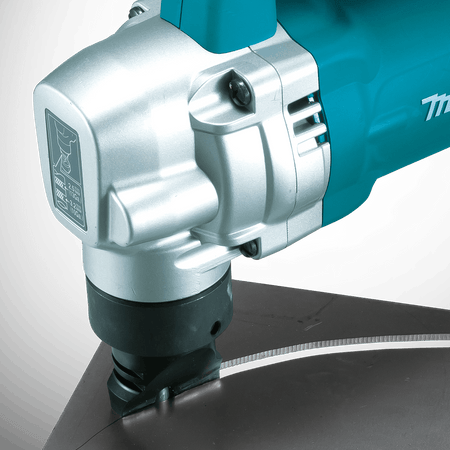 Close-up of the Makita JN3201 nibbler cutting head slicing smoothly through 10-gauge steel plate with clear material thickness reference markings.