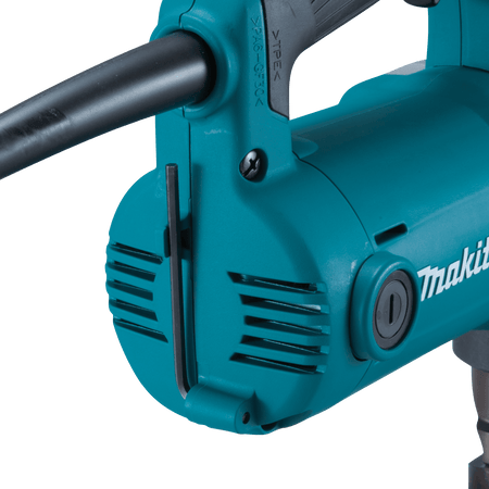 Rear motor housing of the Makita JN3201 nibbler displaying the integrated hex wrench storage slot for quick on-site punch and die adjustments.