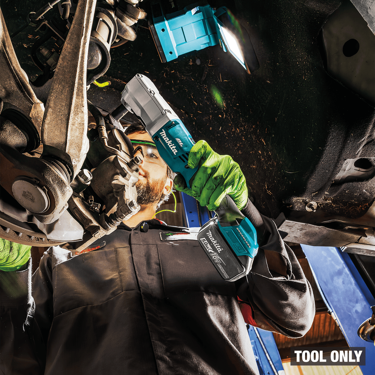 Technician uses the Makita XLT03Z 3/8-inch cordless angle impact wrench for high-torque fastening on vehicle brake calipers.