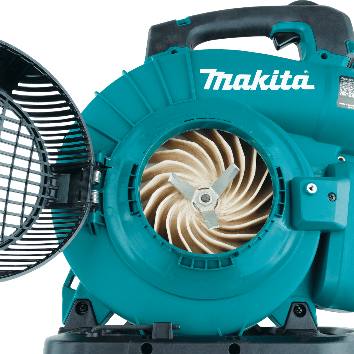 Internal view of the Makita mulcher impeller and shredder blade housing with the access door open.