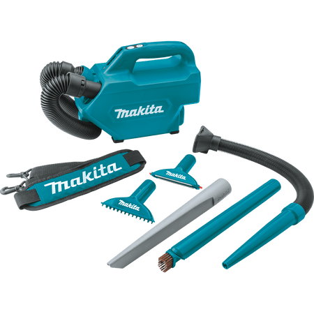 Complete accessory layout for the Makita XLC07Z including soft brush, upholstery nozzle, floor mat nozzle, crevice tool, blower pipe, and strap.