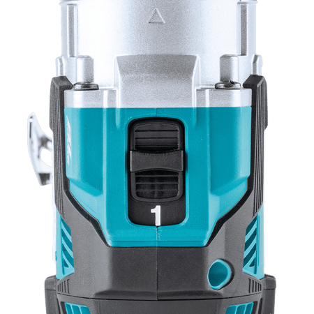 Top-mounted mechanical 2-speed selector switch on the Makita XPH16 hammer drill set to gear 1 for high-torque drilling.