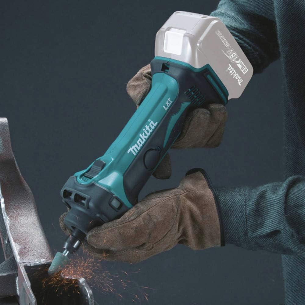 Metalworker holding the Makita XDG02Z die grinder with a mounted stone point to grind a steel weld joint inside a confined metal bracket.