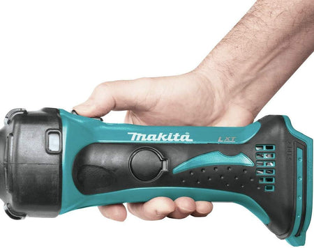 Tradesman holding the slim rubberized barrel grip of the Makita XDG02Z die grinder, demonstrating one-handed control and ergonomics.