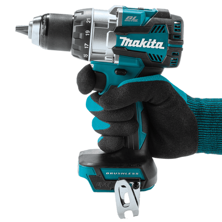 Operator holding the Makita XFD16Z 18V brushless driver-drill showing its compact 6-7/8-inch head length and ergonomic balance.
