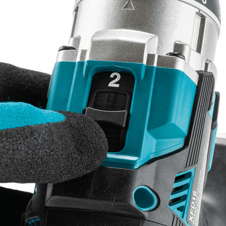 Close-up of the 2-speed mechanical gear selector switch on the Makita XFD16Z drill toggling between 0-550 and 0-1,800 RPM.