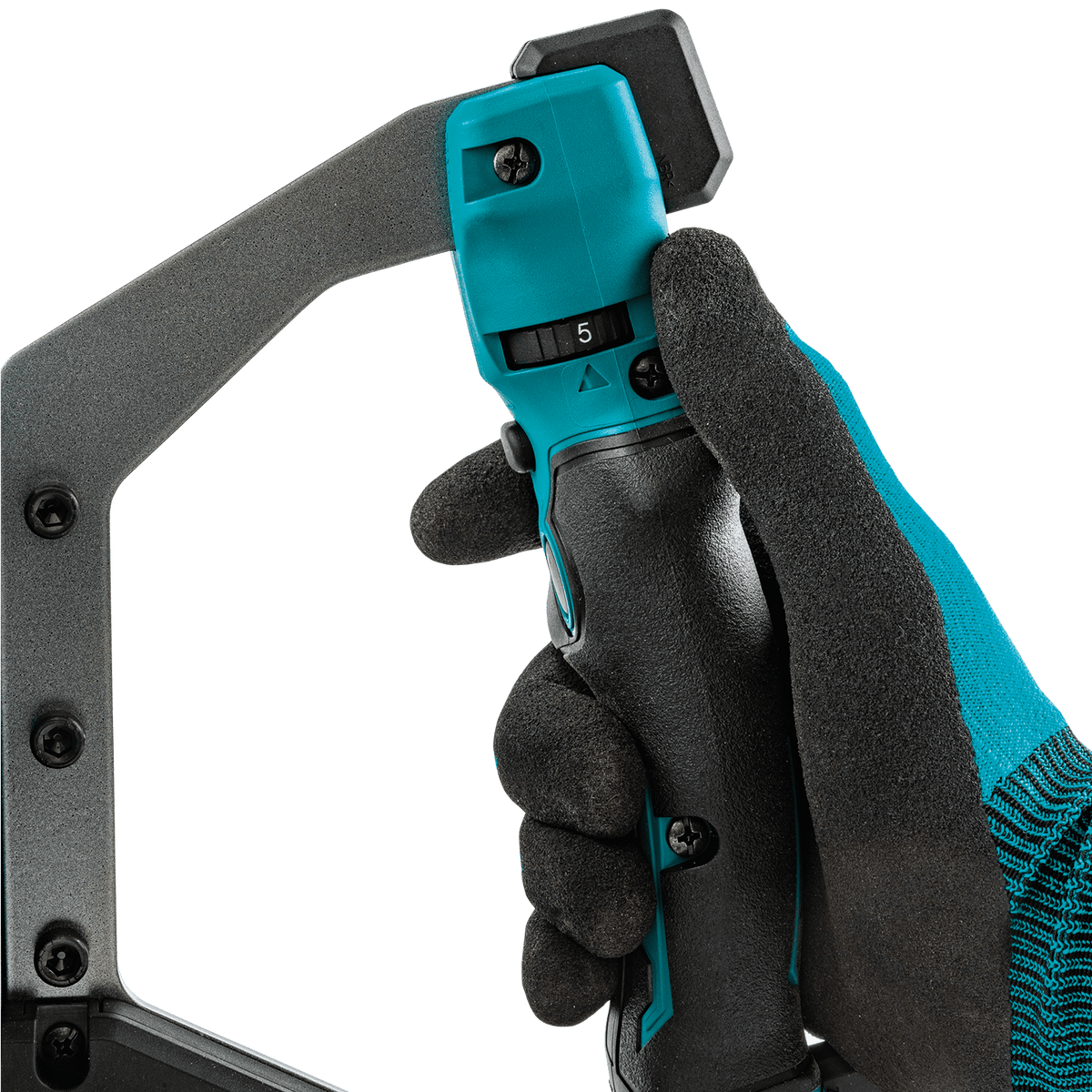 Operator hand adjusting the variable speed dial on the Makita 40V XGT cordless mixer for precise mixing control.