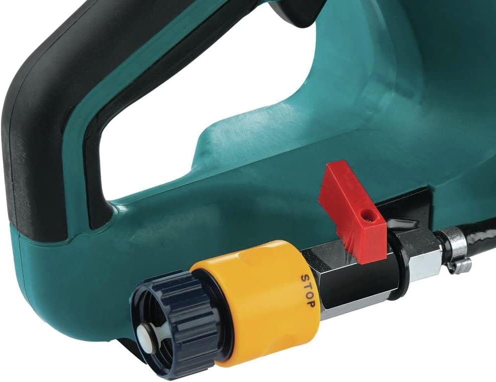 Close-up view of the quick-connect water hose coupling interface situated at the base of the rear saw handle grip, highlighting the yellow hose connector and independent red water flow adjustment toggle valve for OSHA Table 1 silica compliance.