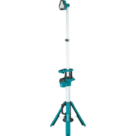 A fully extended Makita DML813 18V LXT cordless tower work light reaching its maximum height on a stable tripod base with a single LED lamp head pointing forward.