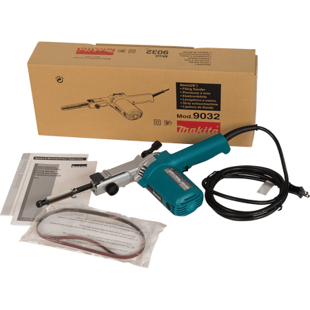 Makita 9032 detail belt sander kit box displaying the instruction manual, 3/8-inch arm assembly, and included 80-grit abrasive belts.