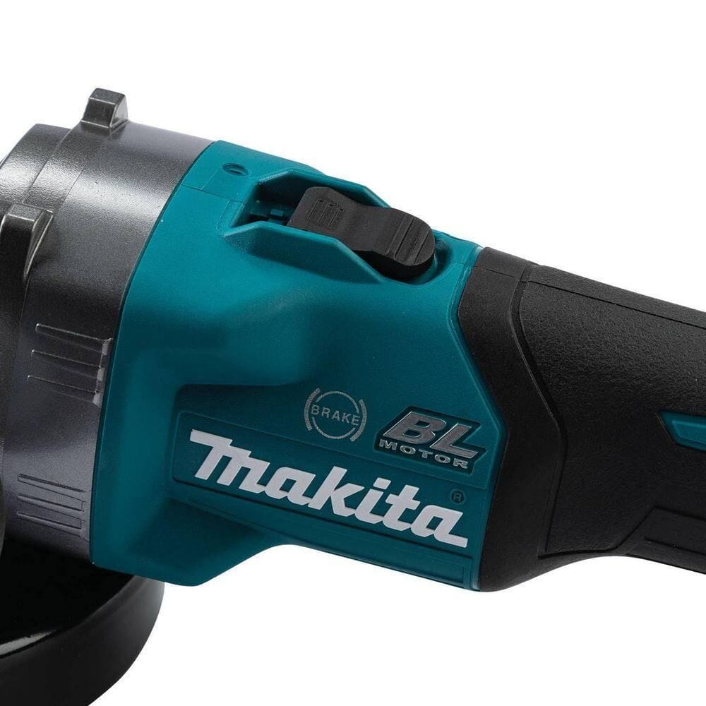 Top-down view of the Makita GAG11Z cordless grinder highlighting the teal industrial housing, professional brushless motor branding, and the ergonomic slide switch with lock-on capability.