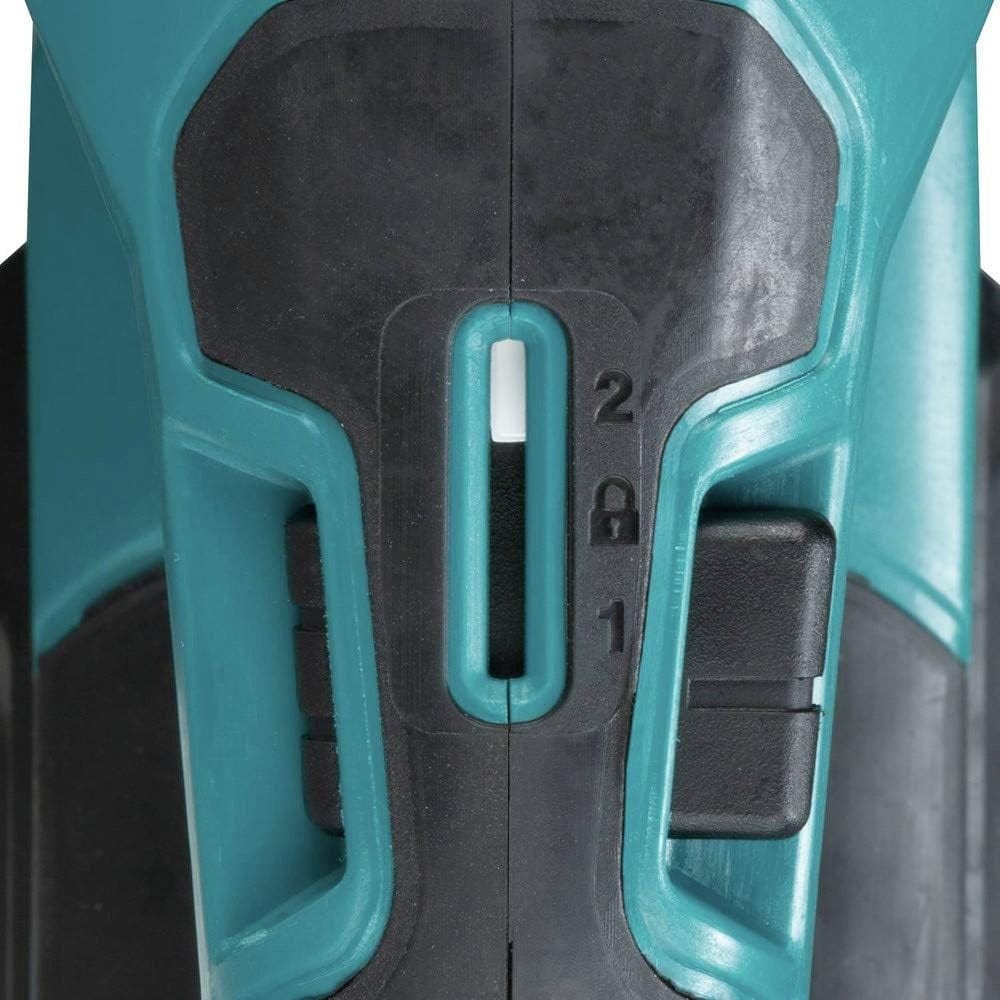 A top-down detailed shot of the Makita GRJ01 reciprocating saw's 2-speed selector switch, offering settings for 0-2,300 SPM and 0-3,000 SPM to match specific cutting applications.