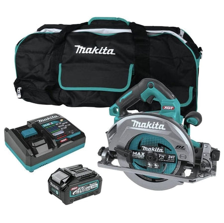 Studio view of the Makita GSH02M1 circular saw kit including the 40V Max XGT saw, one 4.0Ah battery, rapid charger, and large carrying bag.