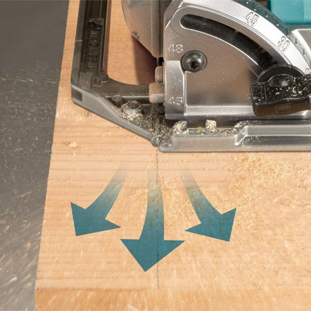 Close-up view of the front of the saw base on wood, with blue arrows indicating the dust blower function clearing the cut line.