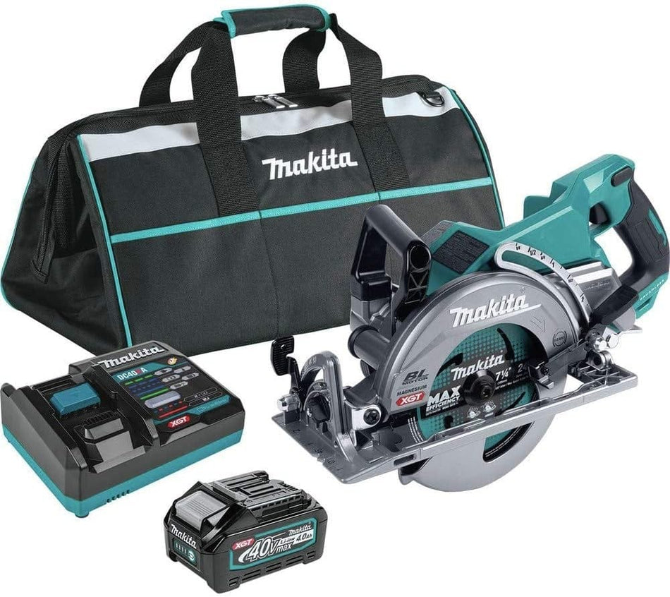 Studio view of the Makita GSR01M1 kit including the rear handle circular saw, a 40V max XGT battery, a rapid charger, and a black and teal contractor tool bag.