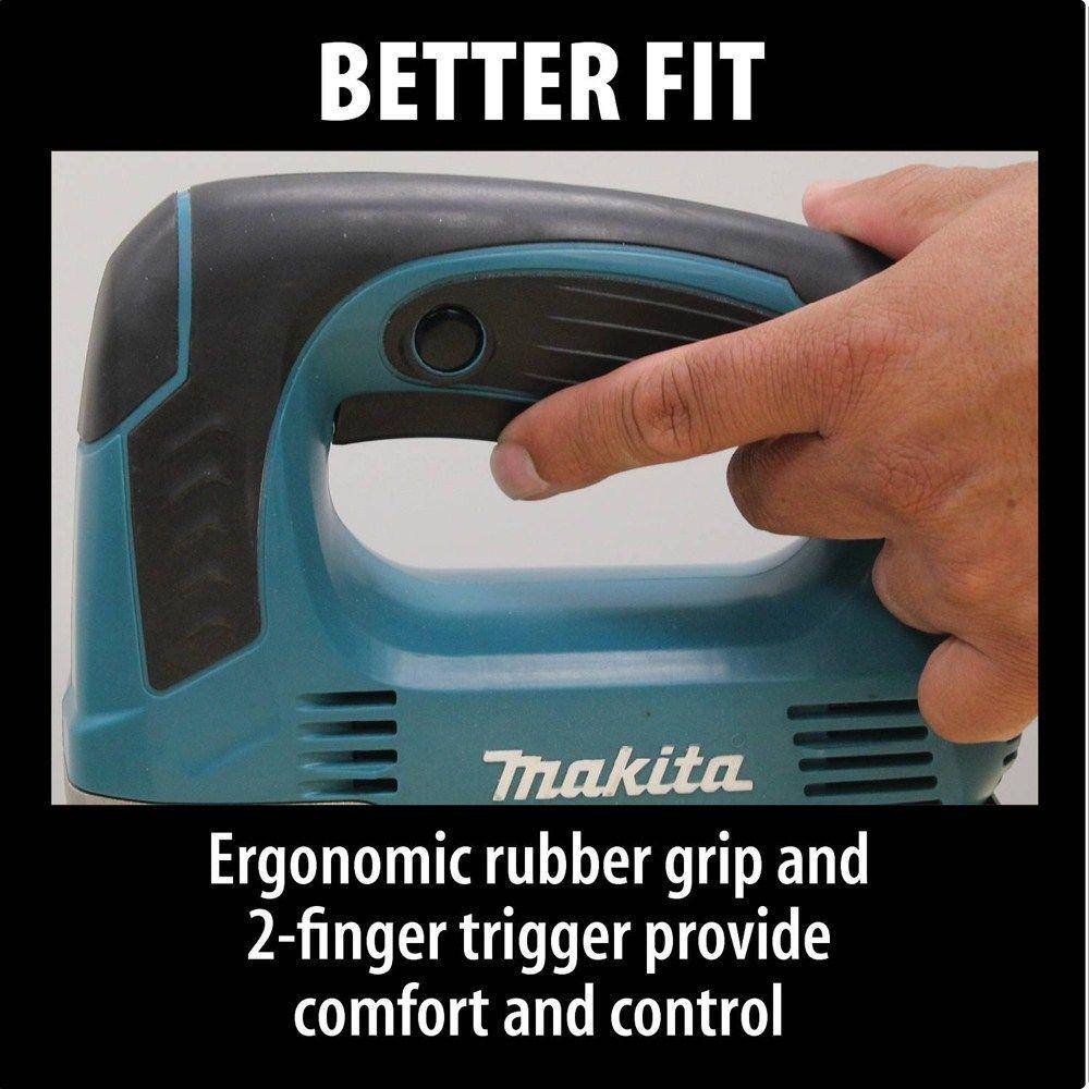 Close-up of the Makita JV0600K orbital jig saw showcasing the rear-mounted variable speed control dial, allowing for precision strokes-per-minute adjustments from 500 to 3,100 SPM.
