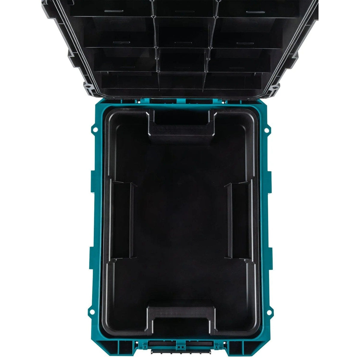 A top-down view of the empty interior of the Makita T-90021 large tool box, showcasing the expansive 3,569 cubic inch holding capacity and the rugged reinforced construction.
