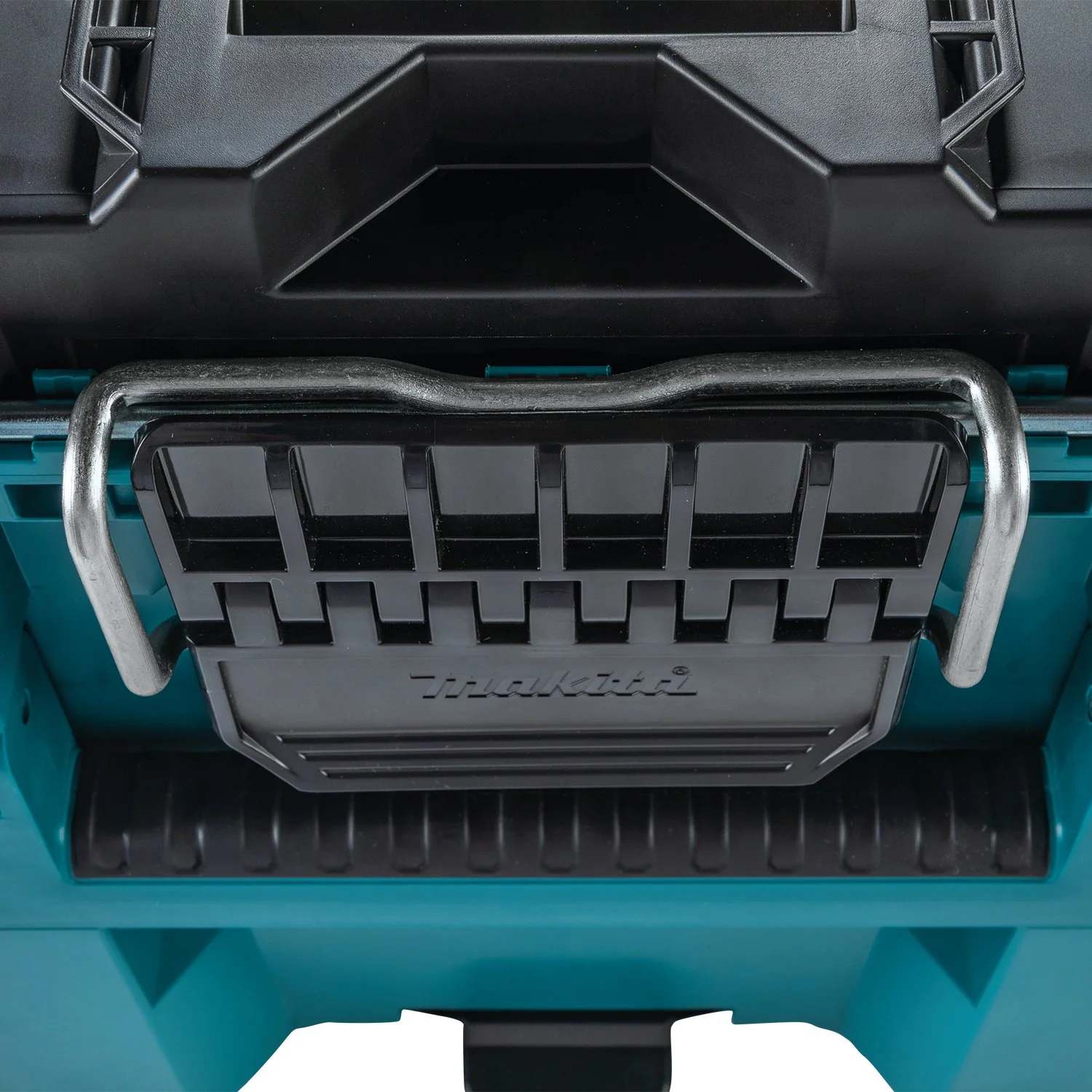 A detailed close-up shot of the heavy-duty metal-reinforced locking bar and large black latch on the Makita MAKTRAK large tool box, designed for maximum durability in tough jobsite conditions.