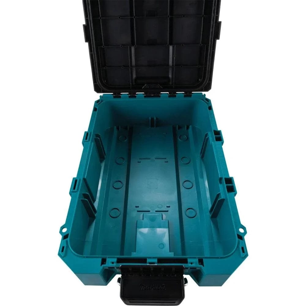 A top-down view of the empty interior of the Makita T-90037 medium tool box, showcasing the large 1,123 cubic inch holding capacity and the rugged impact-resistant copolymer construction.