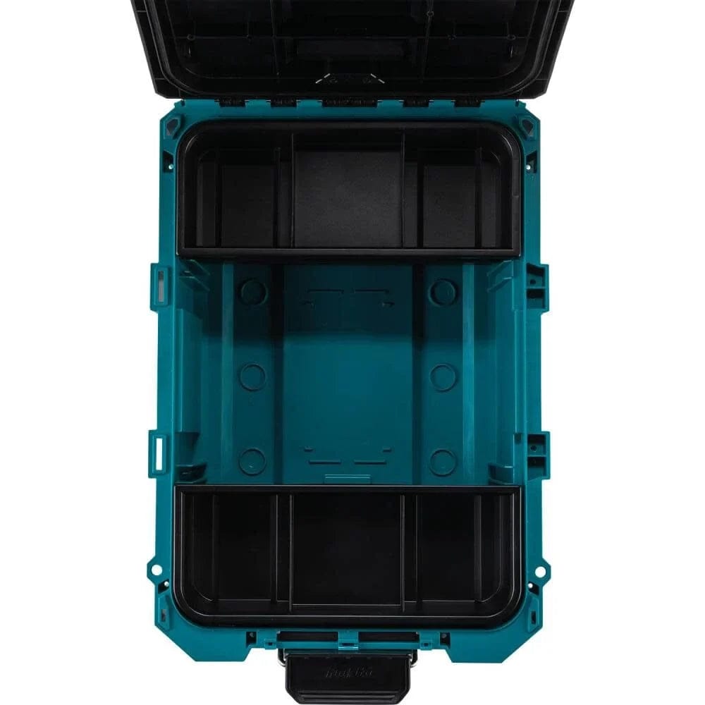 An interior view of the open Makita medium tool box with the deep and shallow trays installed, illustrating the efficient organization of the MAKTRAK modular storage solution.