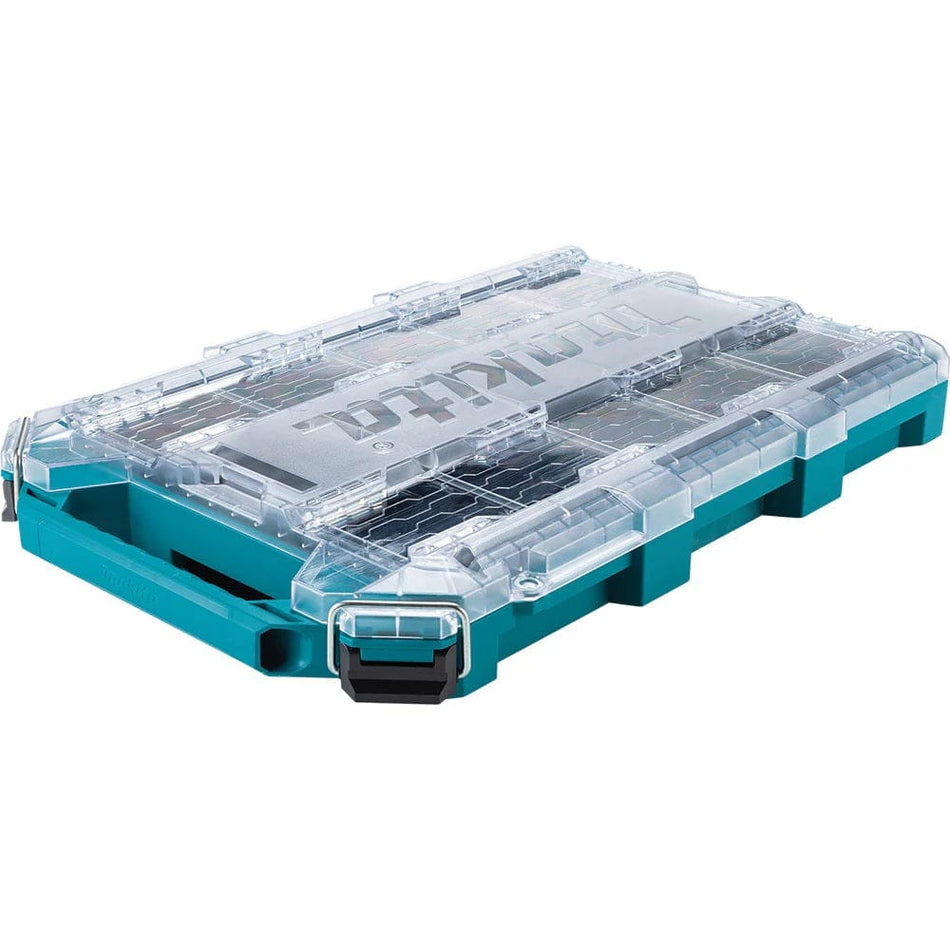 Angled product shot of the Makita MAKTRAK T-90059 low-profile medium organizer featuring a durable teal impact-resistant copolymer body and a clear, heavy-duty lid for easy content identification.