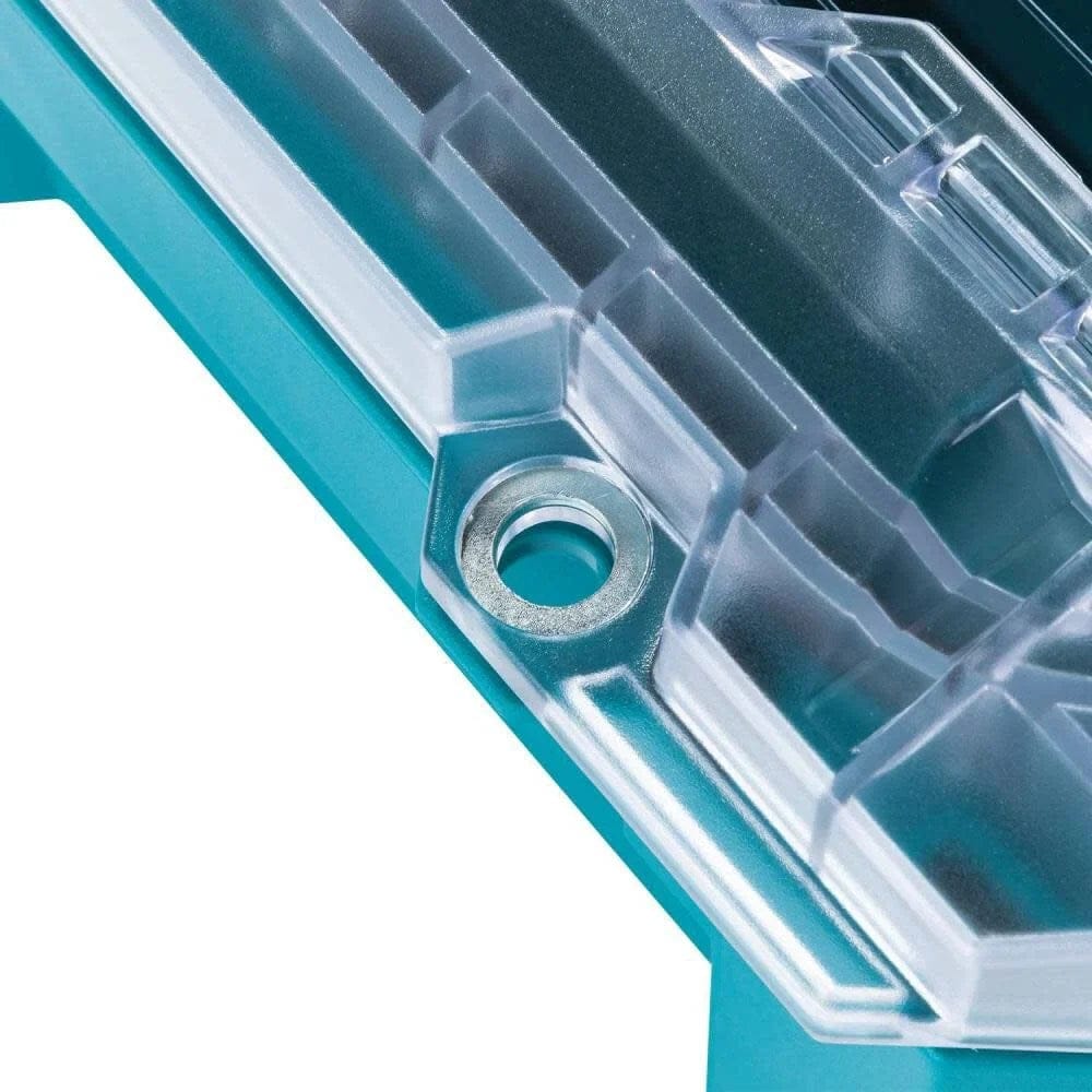 A close-up detail of the metal-reinforced locking point on the clear lid of the Makita MAKTRAK organizer, illustrating the heavy-duty construction and security features of the modular storage system.