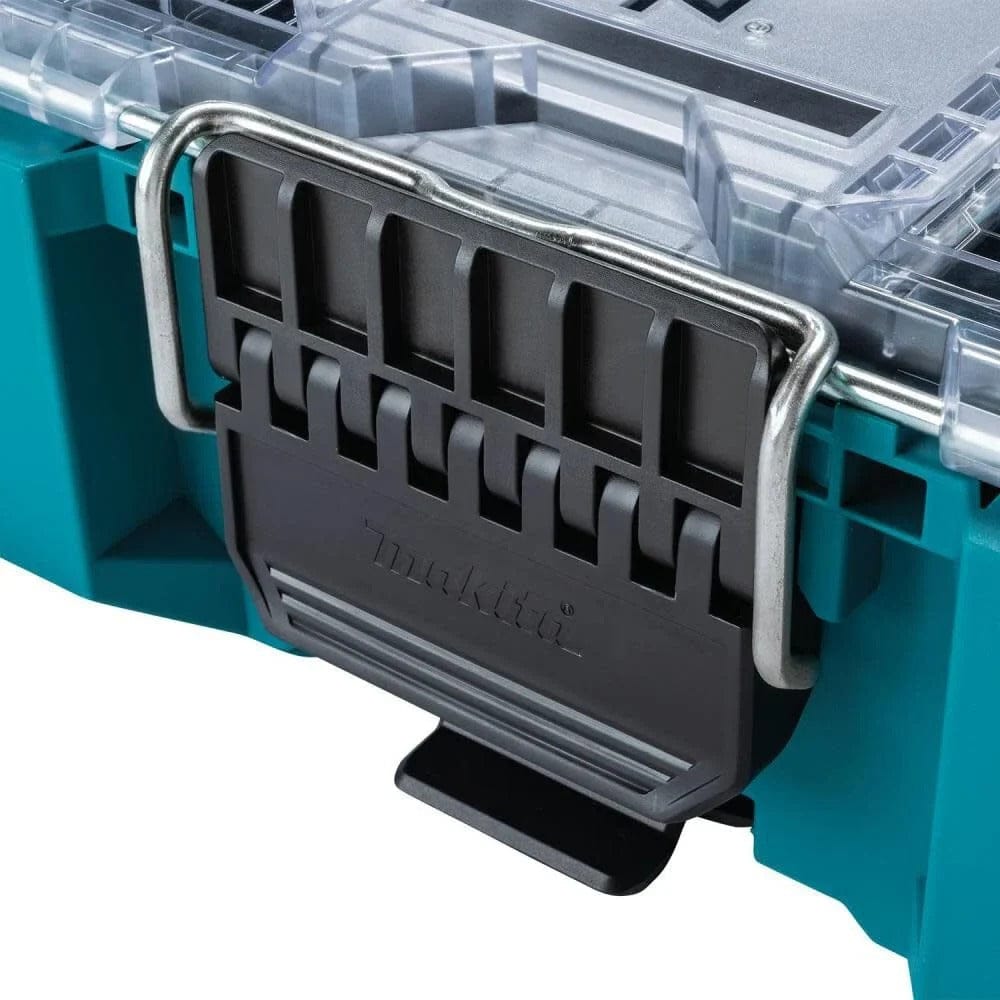 Detailed view of the large, glove-friendly black latch and metal-reinforced locking point on the Makita T-90065 deep compact organizer, designed for rapid access and durability in tough jobsite conditions.
