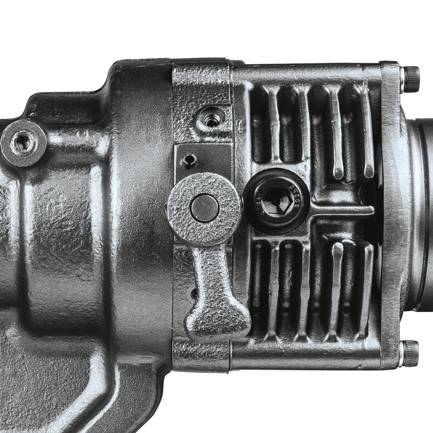 Close-up view of the manual return lever used to retract the punching die mid-operation on the metal punch housing.
