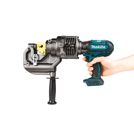 Hand holding the Makita XPP01ZK metal puncher to demonstrate balanced ergonomics and responsive trigger control.