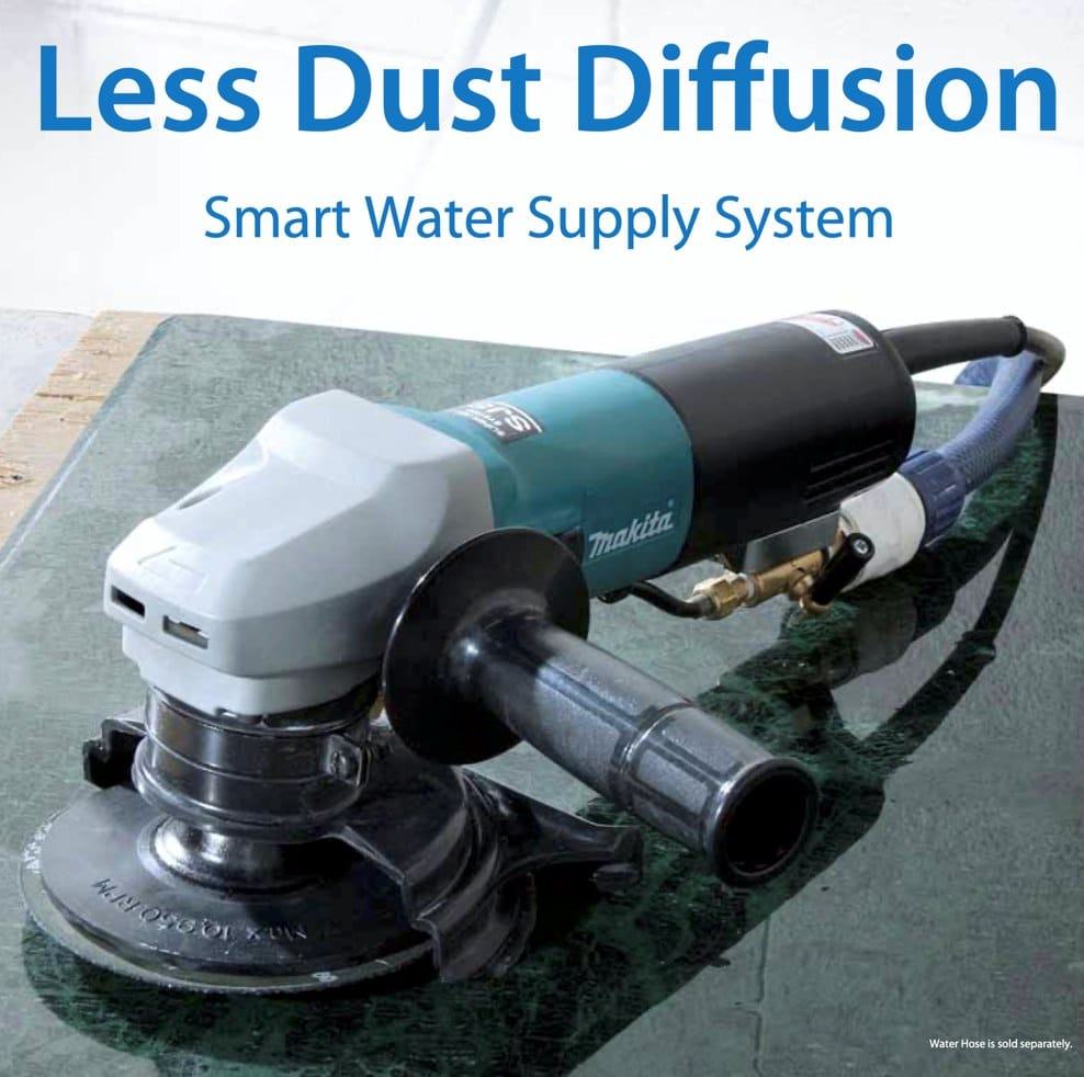 The Makita wet stone polisher resting on a polished green stone surface, highlighting the water supply hose connection and the text "Less Dust Diffusion".
