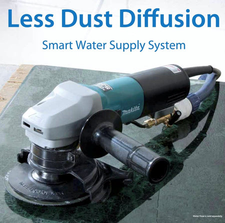 The Makita wet stone polisher resting on a polished green stone surface, highlighting the water supply hose connection and the text "Less Dust Diffusion".