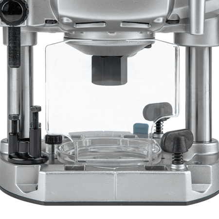 Clear polycarbonate chip deflector and 1/2-inch collet spindle assembly on the Makita RP1800 cast aluminum plunge base.