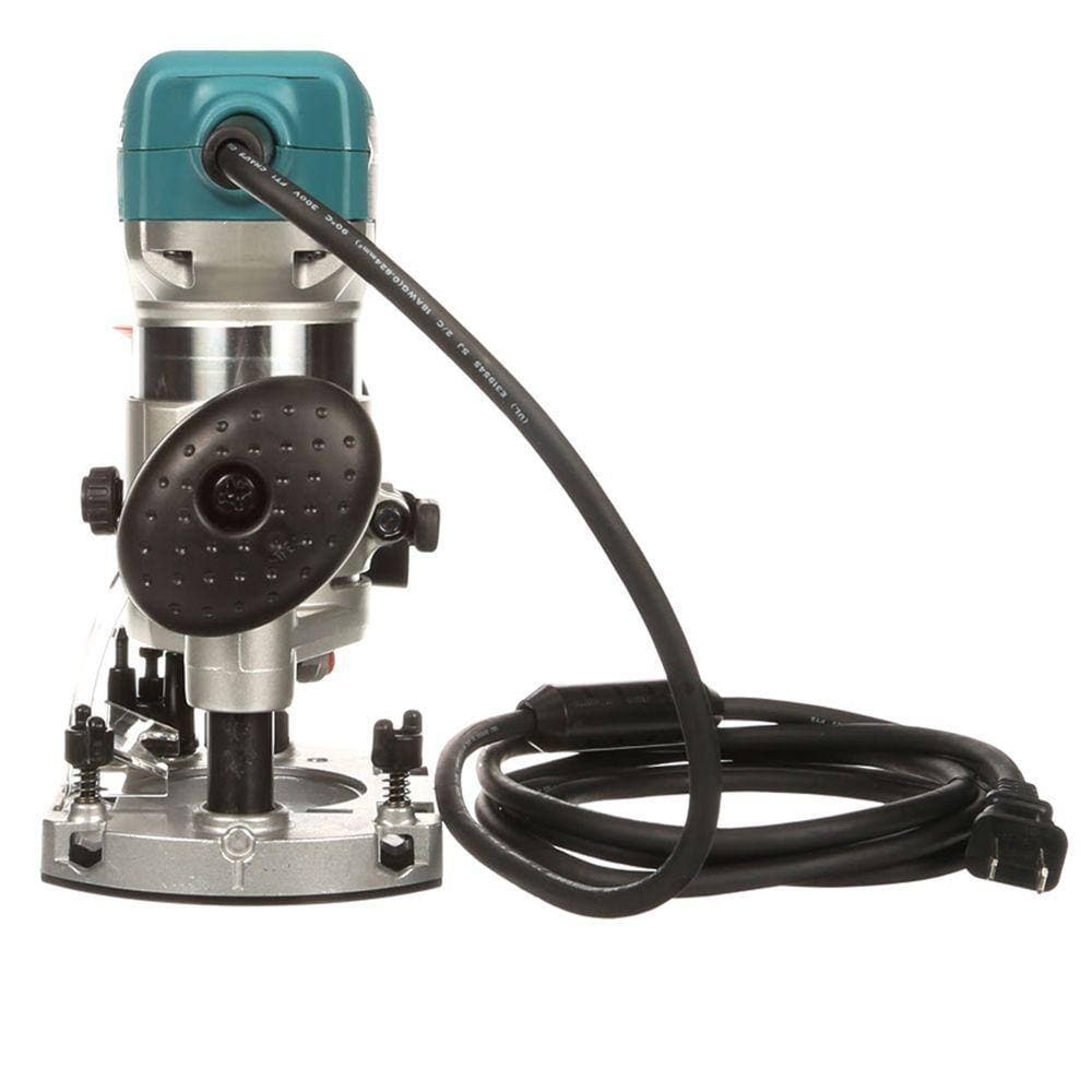 Side view of the Makita compact router securely mounted in the plunge base assembly, displaying the robust power cord and the ergonomically designed rubberized handle.