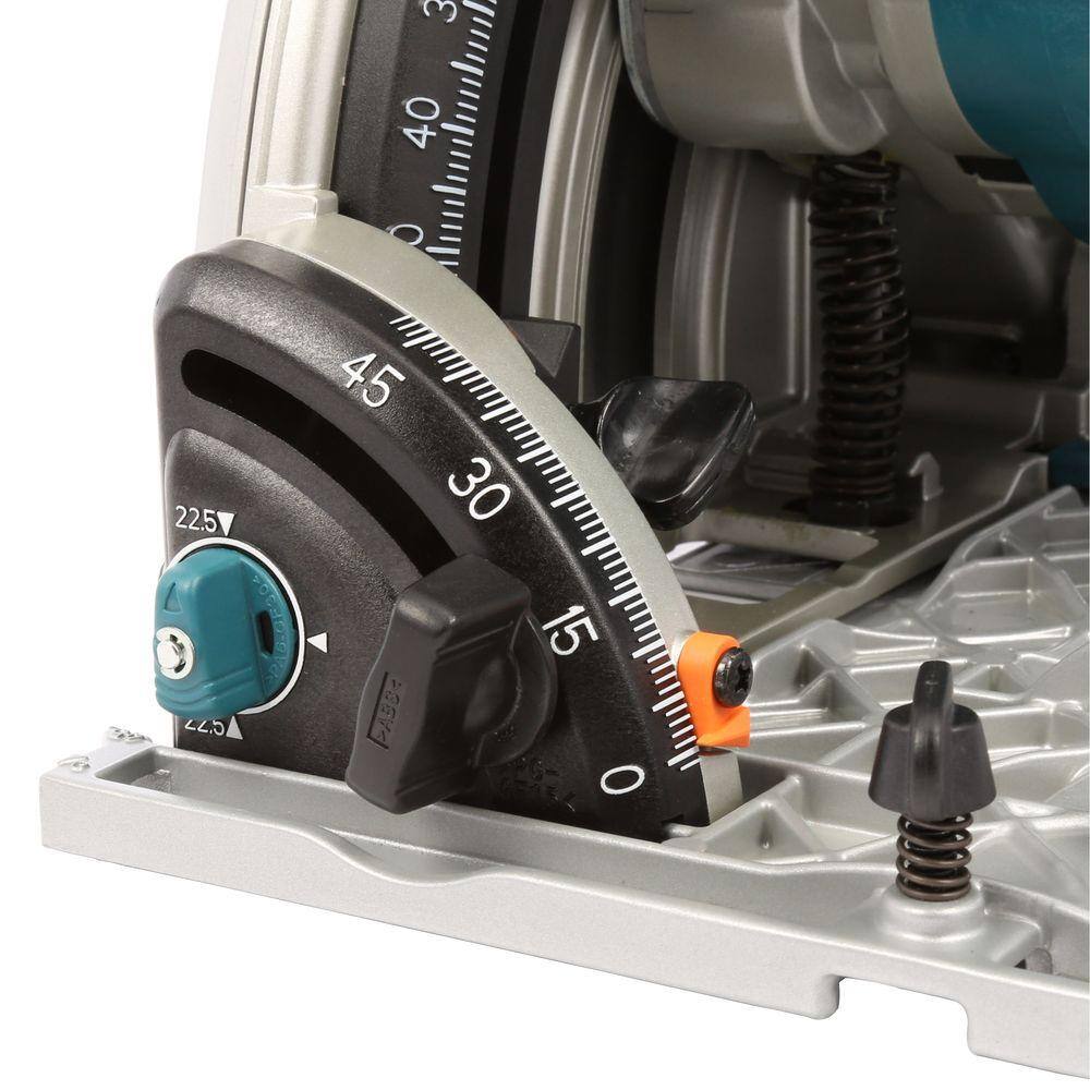 Detailed shot of the electronic variable speed control dial on the Makita SP6000J1, allowing the user to set the motor between 2,000 and 5,200 RPM for optimized material cutting.