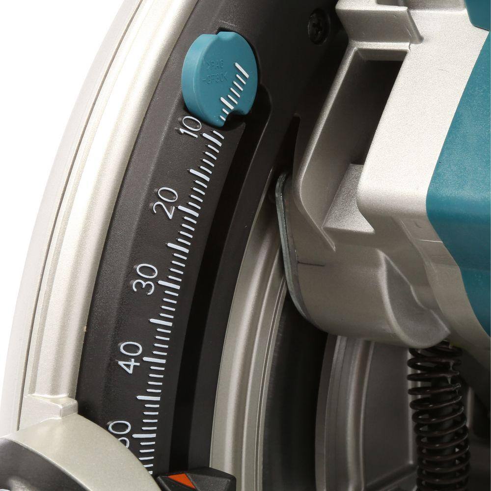 Action-oriented product graphic of the Makita track saw tilted on a guide rail, showcasing the lock-lever system that secures the saw to the rail for stable and precise bevel cutting.