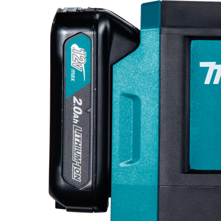 Makita 12V max CXT 2.0Ah lithium-ion slide battery BL1021B mounted on the back of the SK105D cross-line laser level.