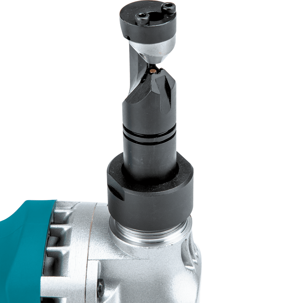 Macro view of the 360-degree rotating die and punch mechanism on the Makita JN1601 nibbler for tight 1-3/4 inch radius cuts.