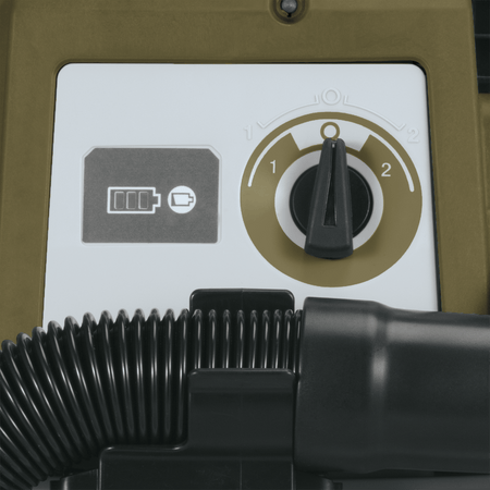 Close-up of the two-speed rotary power switch and battery charge indicator on the Makita ADCV11Z cordless canister vacuum.