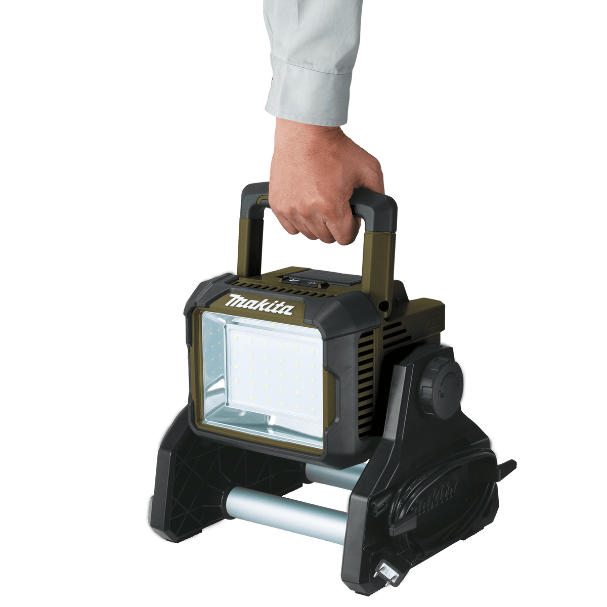 Person carrying the 10.4-pound Makita ADML811 18V LED area floodlight using its ergonomic folding top transport handle.